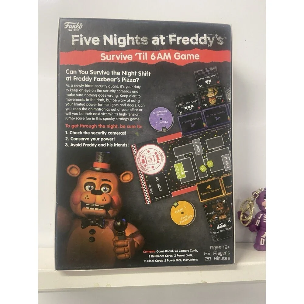 Five Nights At Freddy’s Survive Til 6 AM Game Plus Keychain Figure Combo